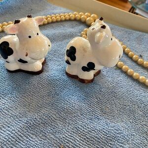 Source Unknown White and Black Ceramic Cow Salt and Pepper Shakers.